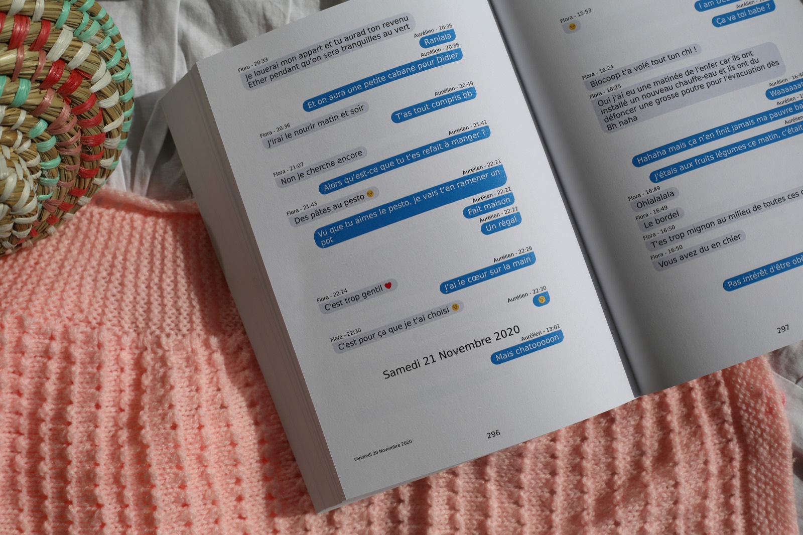 An open book on a knit blanket